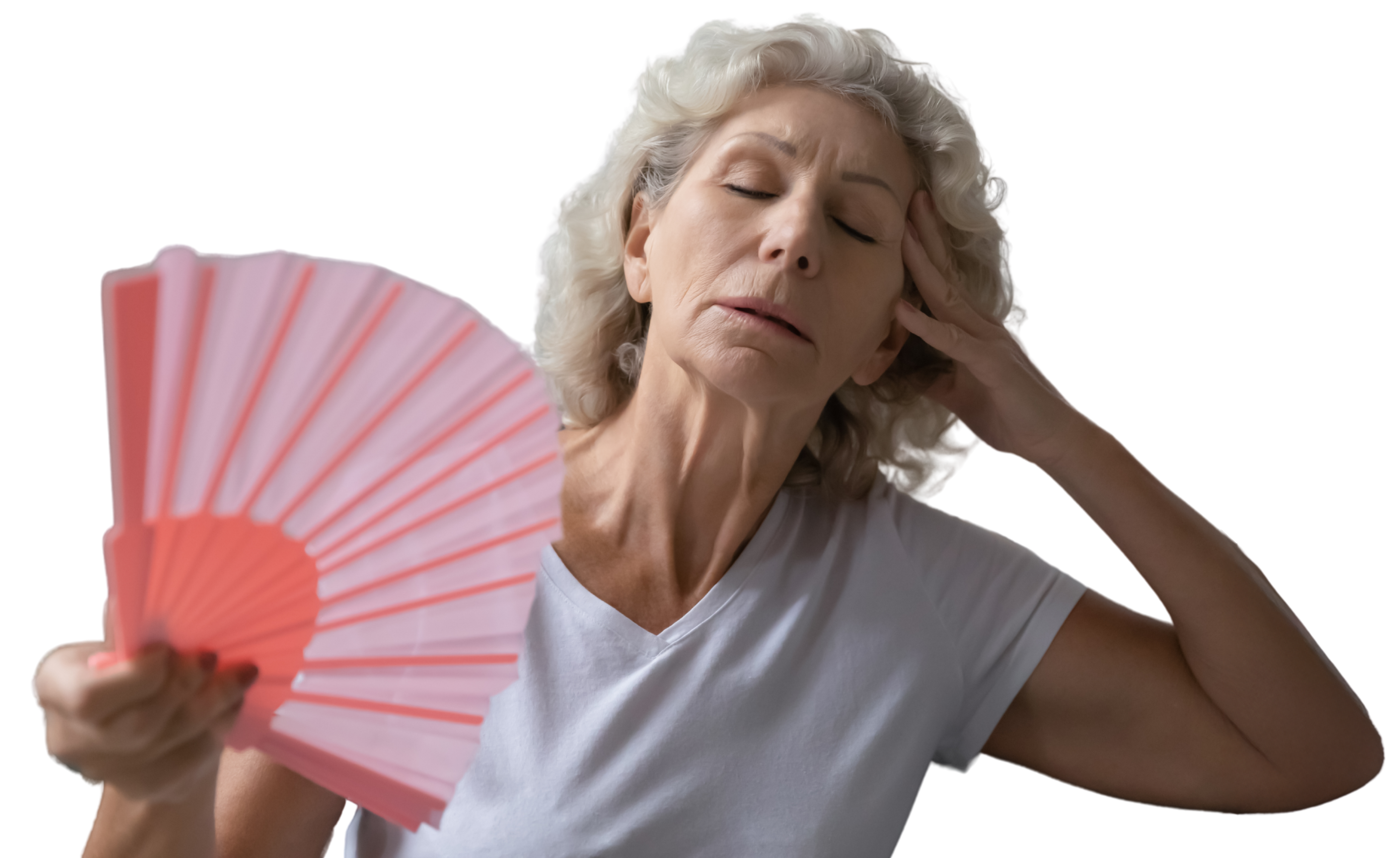 Senior cooling themselves with fan